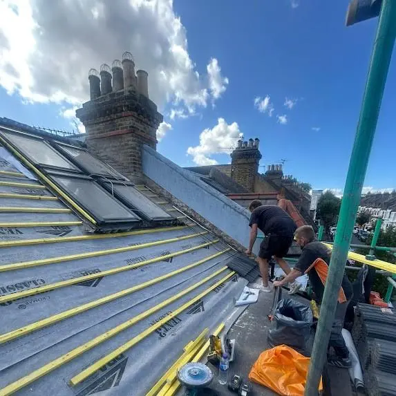 roof repair London team preparing a roof ahead of a dormer loft conversion