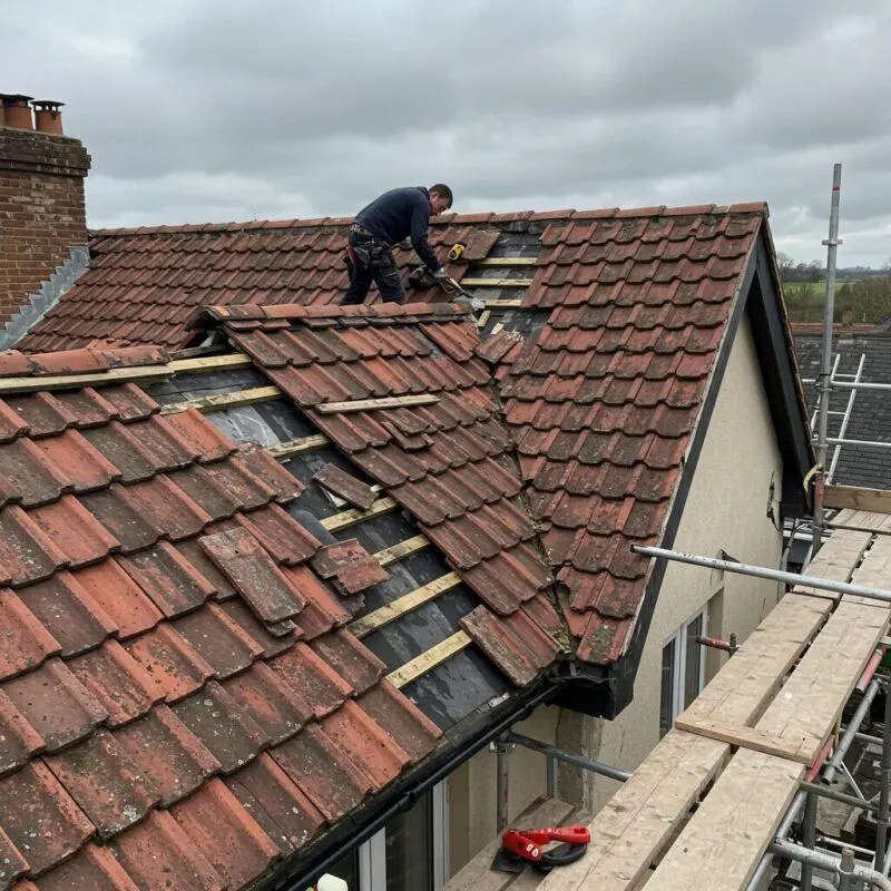 roof repair London engineer sealing flashing on an NW2 loft conversion roof